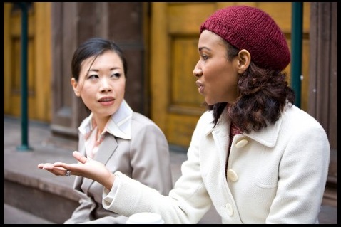 two adults having a conversation
