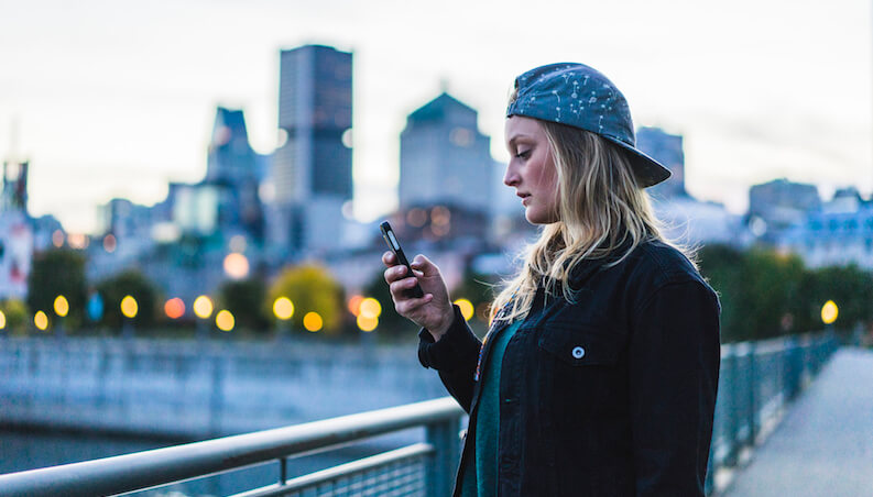Young woman holding phone Young woman holding phone