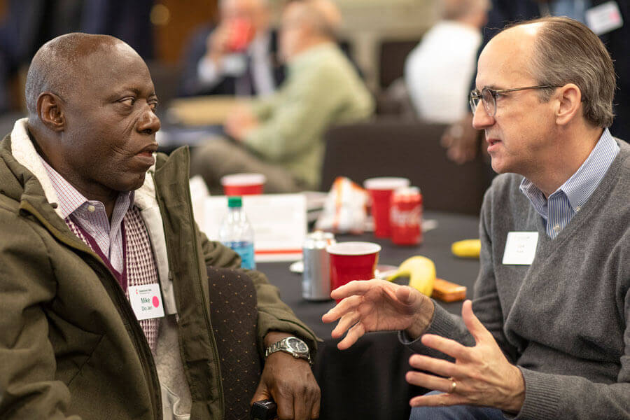 Mike Dido Jen and Dave Nuckols share conversation on questions relating to the church during the Connectional Table meeting held at United Methodist Discipleship Ministries in Nashville, Tenn., April 2. Photo by Kathleen Barry, UM News