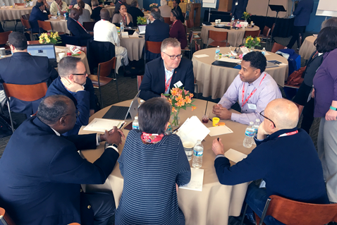 Members of the Connectional Table engage in discussion during their Spring 2018 meeting. Image courtesy of the Connectional Table.