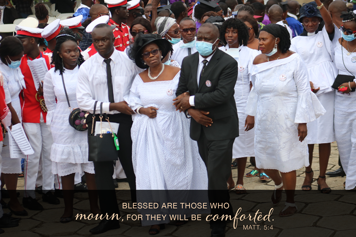 Family and friends of Bishop John K. Yambasu, (front row, from left) Elizabeth Yambasu, Emmanuel Yambasu, widow Millicent Yambasu and Alfred Lansana, arrive at the burial site on the campus of United Methodist University in Freetown, Sierra Leone, on Sept. 6. Photo by E Julu Swen, UM News.