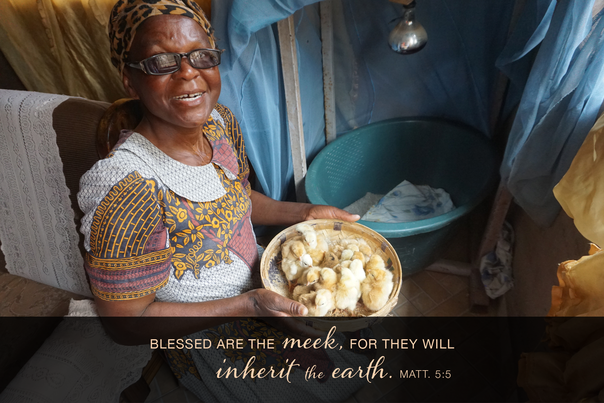 Nyengeterai Mafongoya holds a basket of 20-day-old chicks in Masvingo, Zimbabwe. She started with 20 chicks as part of a United Methodist Women poultry project in February and grown her brood to 100 birds. Photo by Kudzai Chingwe, UM News.