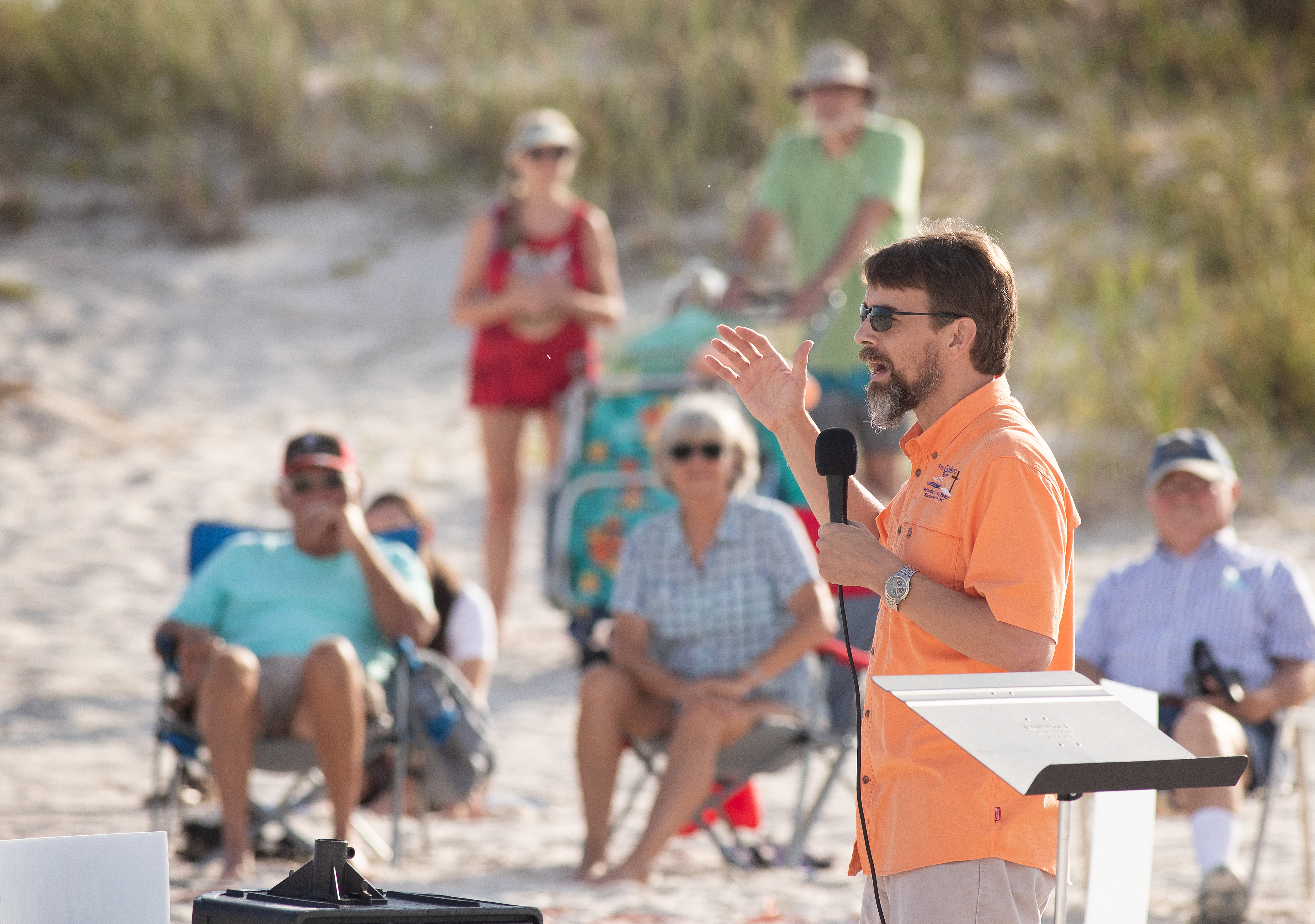 The Rev. Nolan Donald gives the sermon during the Galilean Beach service, a ministry of Foley (Ala.) United Methodist Church at Gulf State Park in Gulf Shores, Ala. Photo by Mike DuBose, UM News.