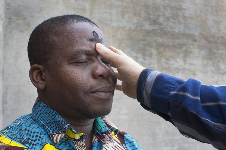 Ashes are received on the forehead on Ash Wednesday, marking the first day of Lent as well as a reminder that we will all "return to dust" someday. Photo illustration by Kathleen Barry, UMNS