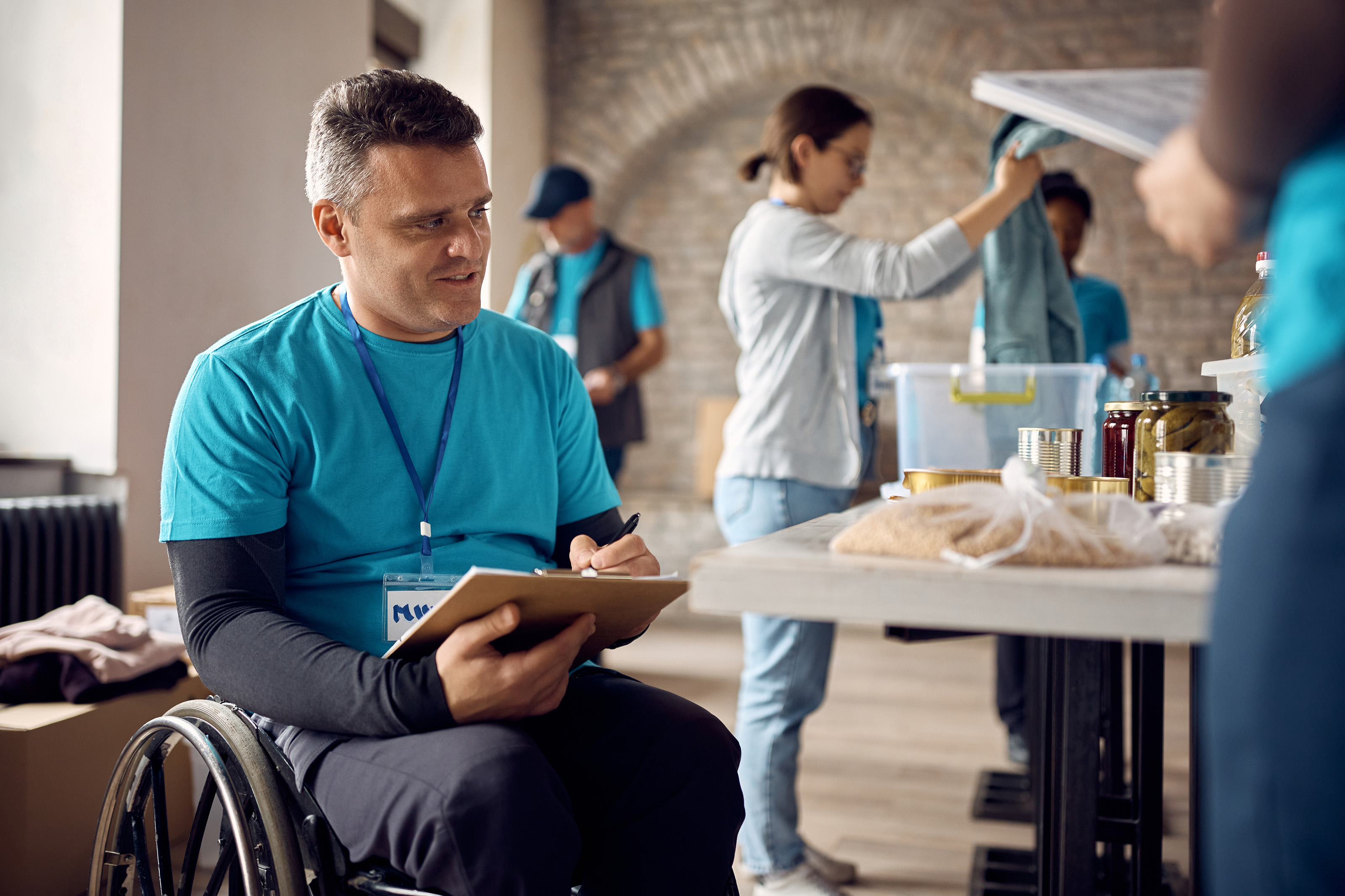 Individuals with disabilities may encounter barriers that hinder their active participation in volunteer efforts. Don't allow negative stereotypes to dissuade you from actively seeking their help. Getty Images.