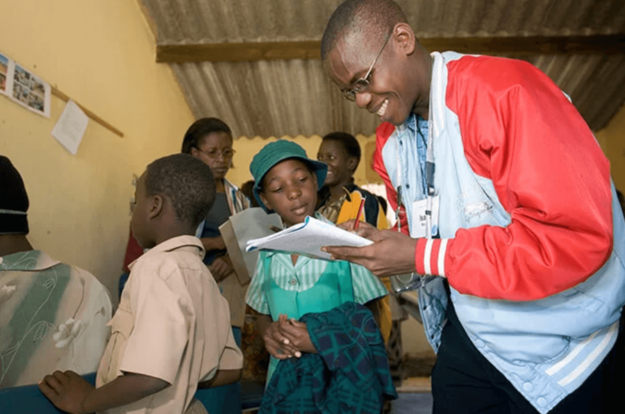 Isaac Broune working with children isaac-2