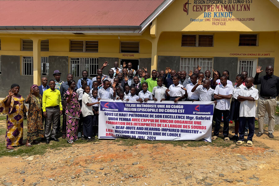Members of Lokole United Methodist Mission in Kindu rejoice as they launch a new ministry dedicated to serving people who are hearing impaired. Photo by Chadrack Londe.