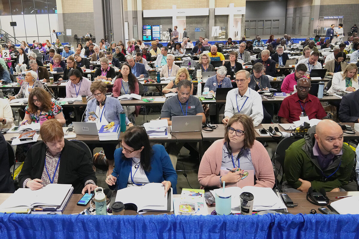 Delegates prepare to do their legislative work during the 2024 United Methodist General Conference in Charlotte, N.C., in Charlotte, NC. The board of the General Council on Finance and Administration approved a request for $1.5 million to pay for a whole software system to track legislation at General Conference. The current system has been in use for nearly 40 years. Photo by Larry McCormack, UM News.